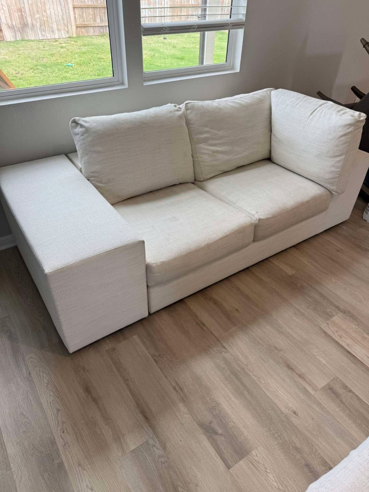 White fabric sofa after upholstery cleaning by Next Level Clean in Winnipeg
